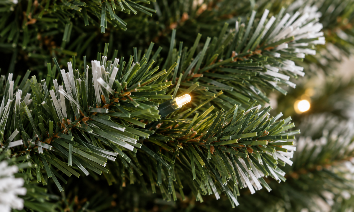 Green Flocked Christmas Tree with Red Berries and Pine Cones - Fullness