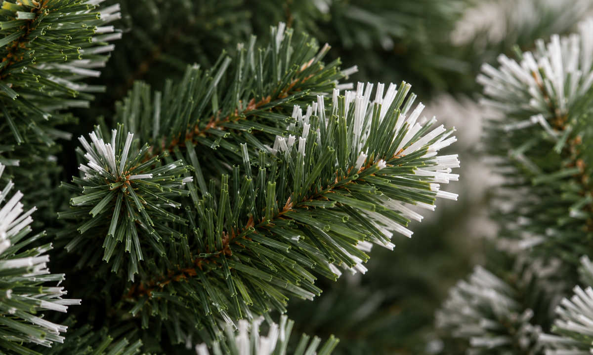 Green Flocked Christmas Tree with Red Berries and Pine Cones - Realism