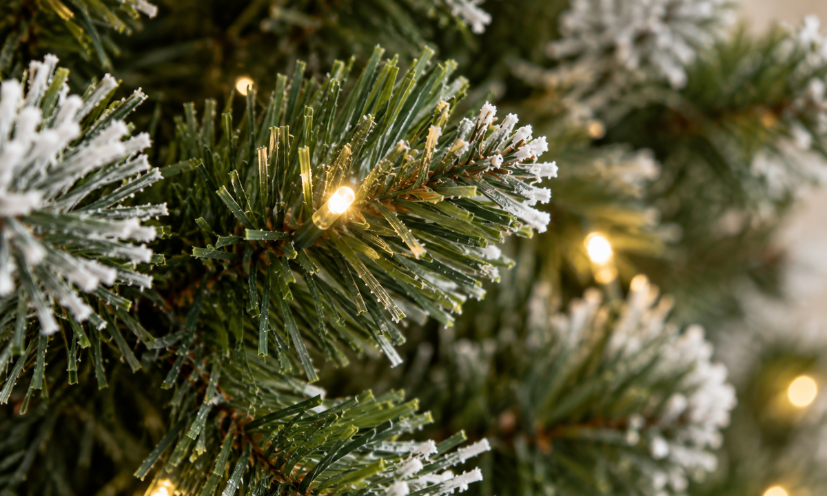 Snow Flocked Christmas Tree with Natural Pinecones - Fullness